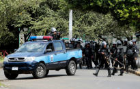 Riot police prepare to clash with demonstrators during a protest against Nicaraguan President Daniel Ortega's government in Managua, Nicaragua September 23, 2018. REUTERS/Oswaldo Rivas