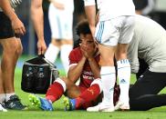 <p>The enormity of his shoulder injury is obvious to Mo Salah </p>