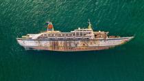 <p>A capsized luxury cruise liner floats off the coast of Thailand.</p>