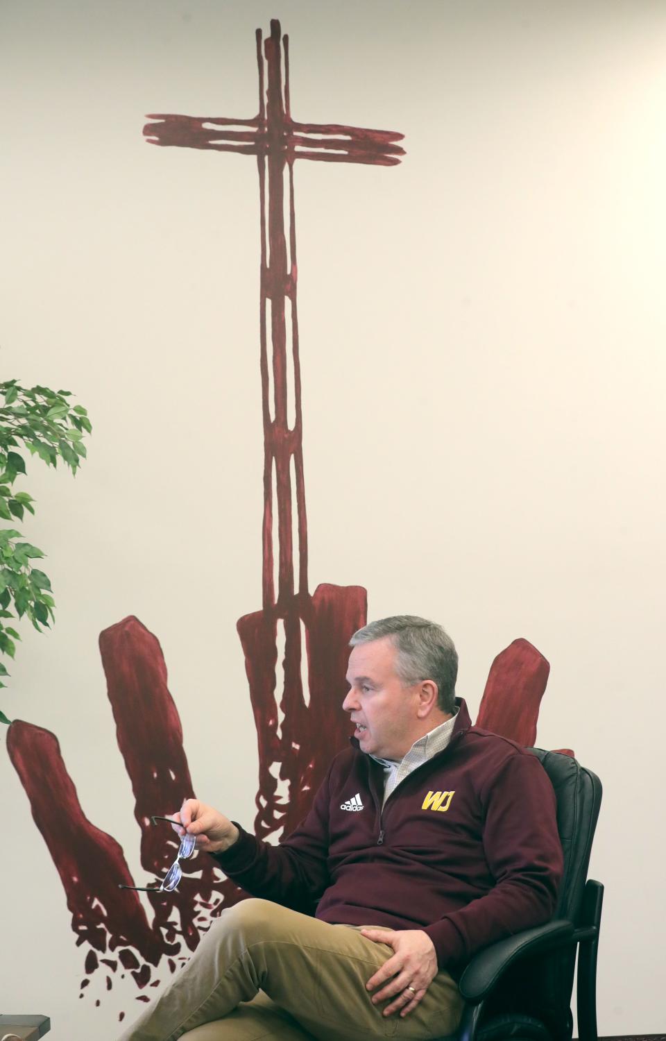 Retiring Walsh Jesuit High School President Karl Ertle talks about his tenure there during an interview Thursday in Cuyahoga Falls.