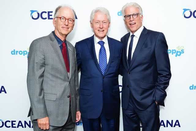 <p>Sean Zanni/Patrick McMullan via Getty </p> Oceana's former CEO Andrew Sharpless, Bill Clinton and Ted Danson at the Oceana gala in 2019.