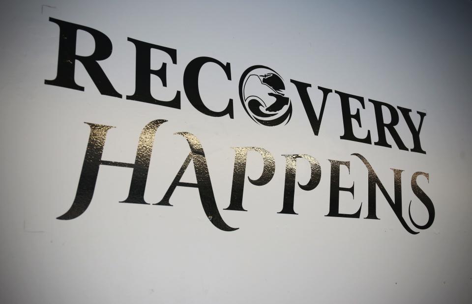 A "recovery happens" sign at Blue Water Recovery and Outreach Center, 617 10th St., in Port Huron.
