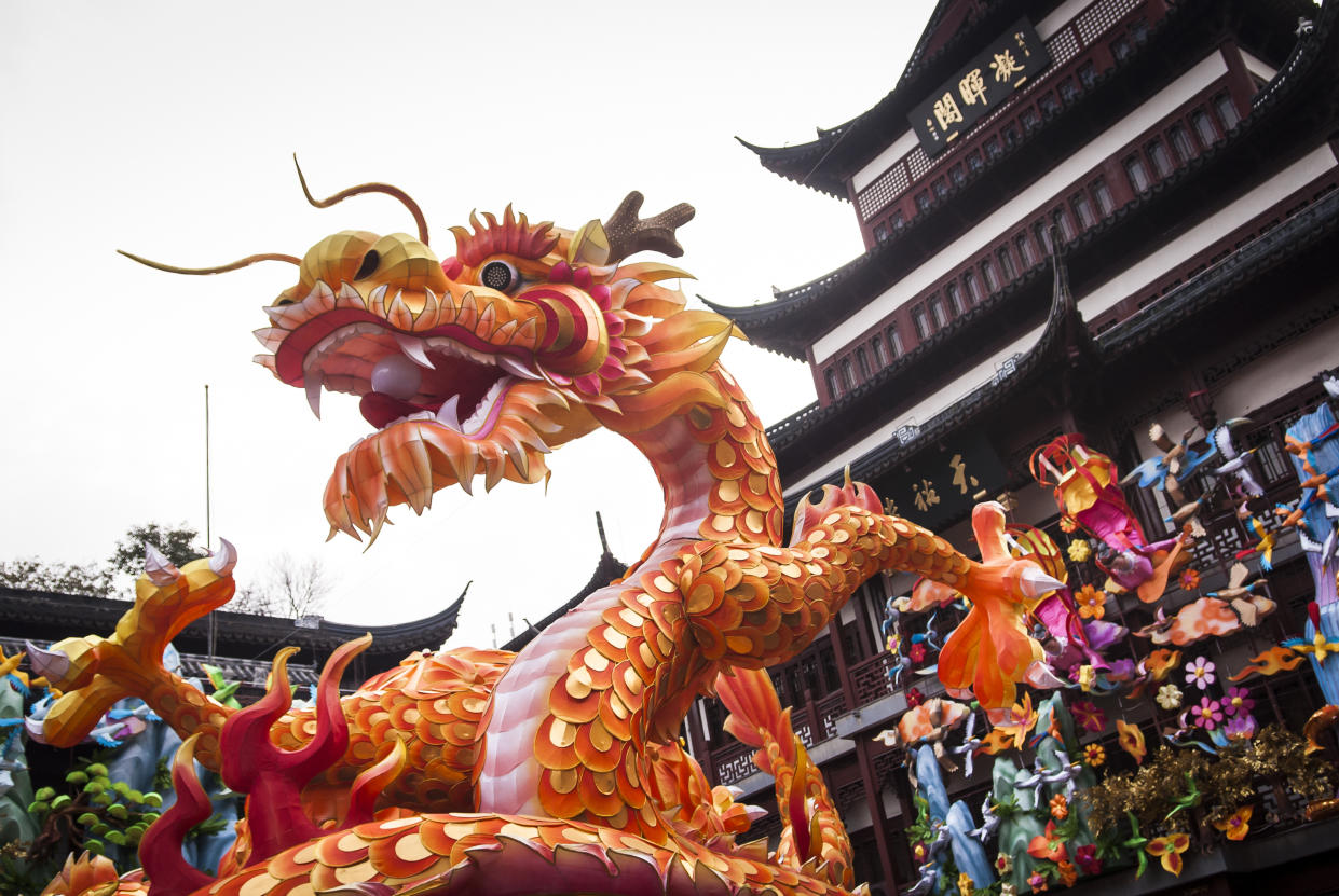 Colourful lantern shaped of a Chinese the Dragon are put up on the street in the central of Yuyuan old town in Shanghai.