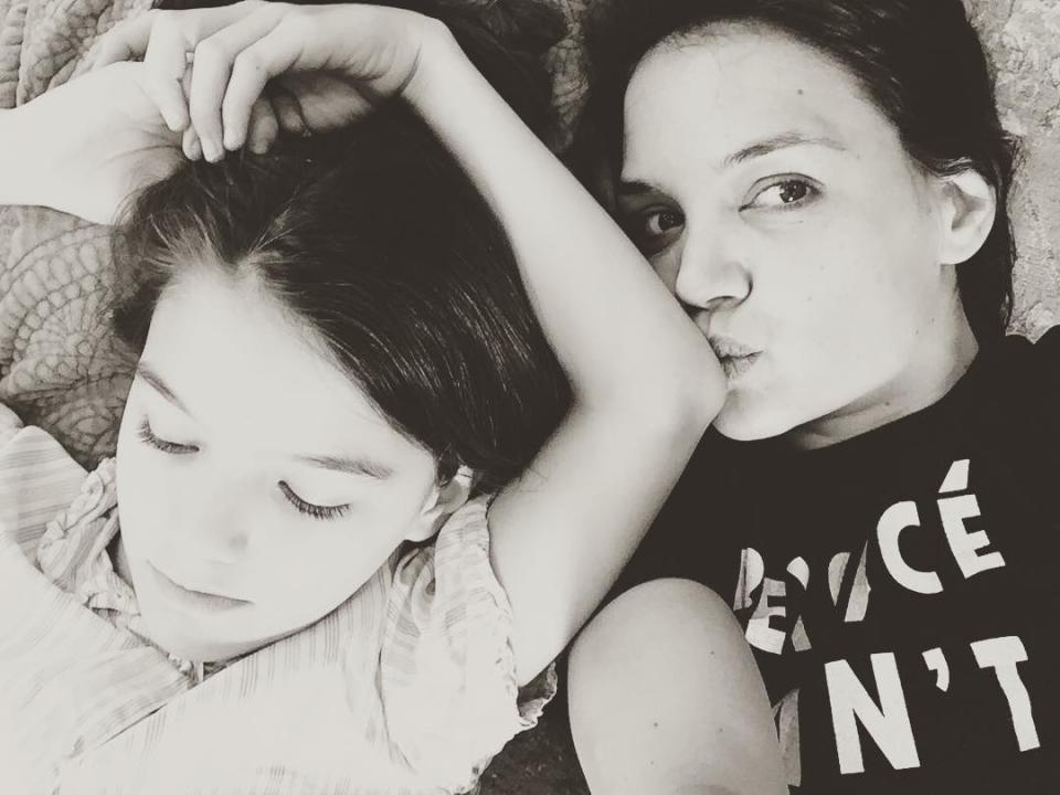 <p>There’s nothing like a mother’s love! The actress shared several pics in celebration of Mother’s Day, including this sweet selfie of her kissing daughter Suri’s elbow. (Photo: <a rel="nofollow noopener" href="https://www.instagram.com/p/BUFR3N2jAel/" target="_blank" data-ylk="slk:Katie Holmes via Instagram;elm:context_link;itc:0;sec:content-canvas" class="link ">Katie Holmes via Instagram</a>) </p>