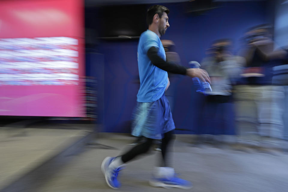 FC Barcelona's Lionel Messi leaves a press conference at the Sports Center FC Barcelona Joan Gamper in Sant Joan Despi, Spain, Friday, May 24, 2019. FC Barcelona will play against Valencia in the Spanish Copa del Rey soccer match final on Saturday. (AP Photo/Manu Fernandez)