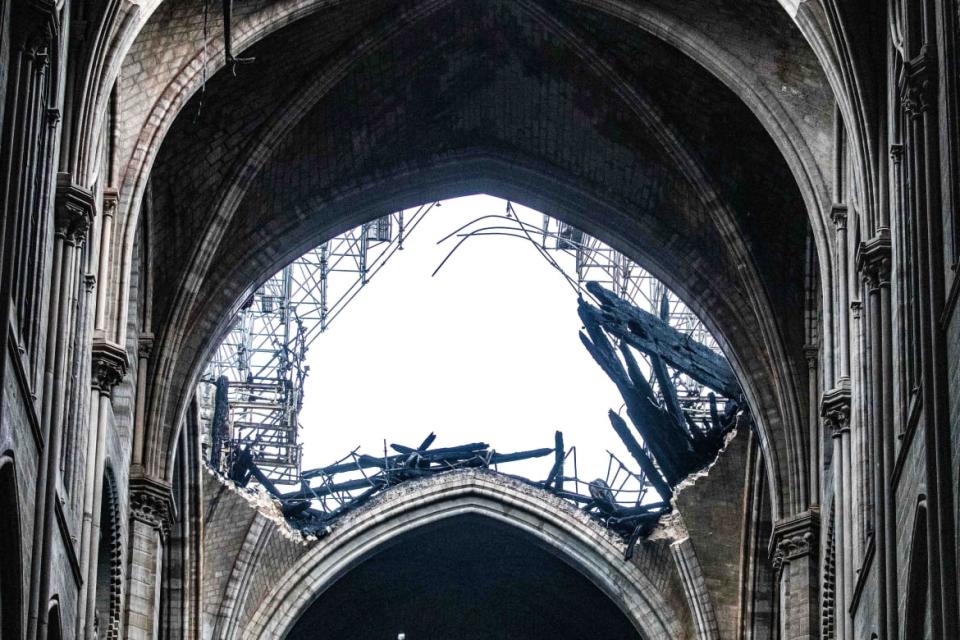 <div class="inline-image__caption"> <p>Daylight shines through the fallen roof structure of Notre Dame Cathedral following the fire in Paris, France, on Tuesday, April 16, 2019.</p> </div> <div class="inline-image__credit">Christophe Morin/Bloomberg via Getty Images</div>