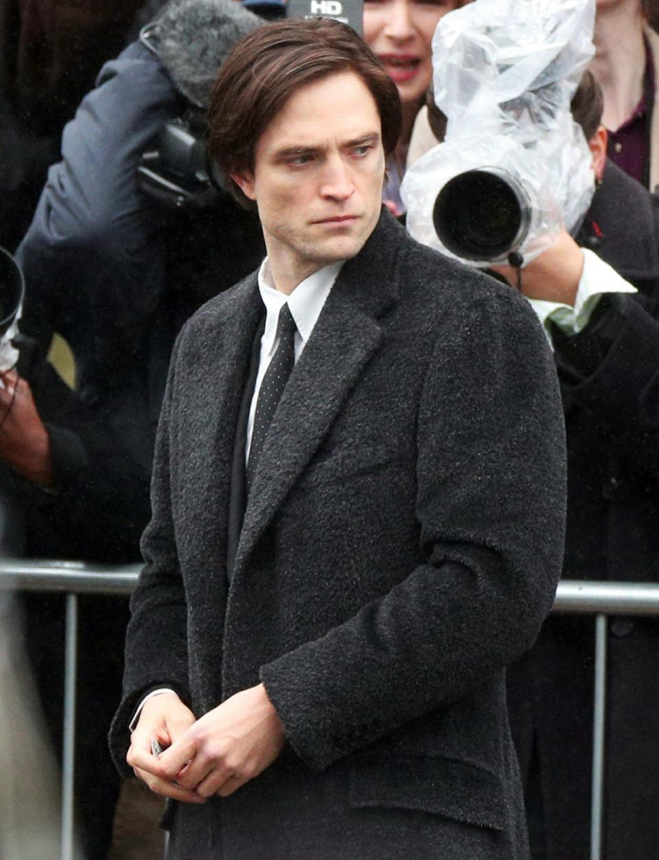 <p>Robert Pattinson is seen on Monday outside of St. George's Hall in Liverpool, London filming scenes for <em>Batman</em>.</p>