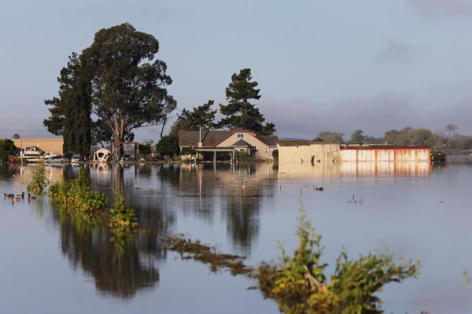 A farm is inundated with flood waters from the Pajaro River on 16 March.