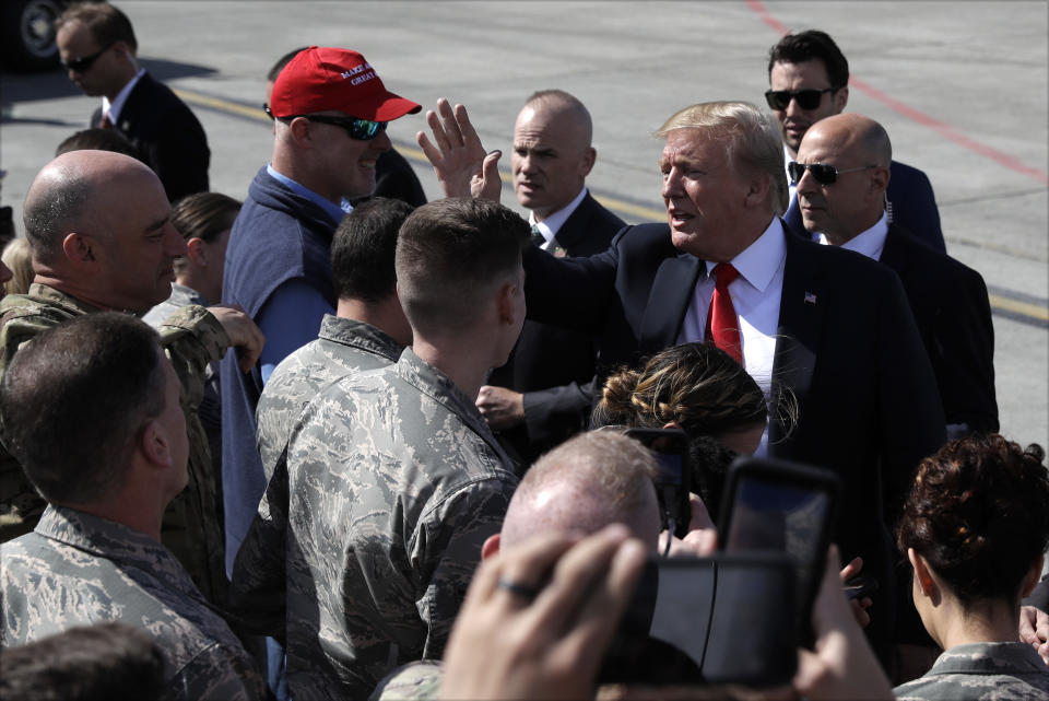 President Donald Trump greets troops after landing at Joint Base Elmendorf-Richardson for a refueling stop en route to Japan Friday, May 24, 2019, in Anchorage. (AP Photo/Evan Vucci)