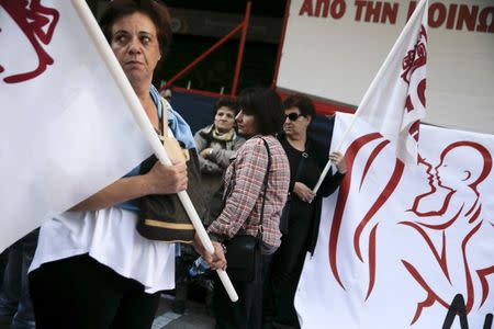 Protesters take part in an anti-austerity demonstration outside the Labour Ministry building in central Athens, Greece, October 15, 2015. REUTERS/Alkis Konstantinidis