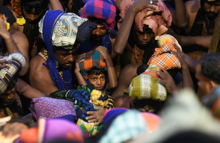 India's Supreme Court has ruled that all females could enter the shrine but women have been absent from the crowds of pilgrims thronging the site