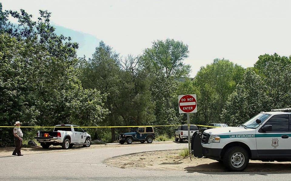 The Water Wheel Campground parking lot is blocked off by authorities  - Credit: AP