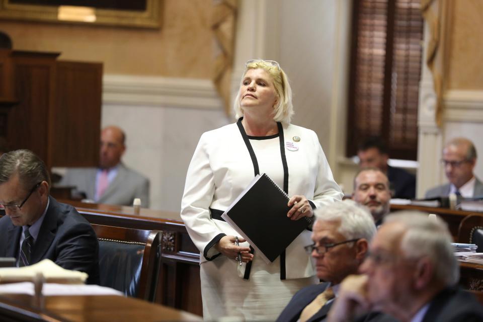 South Carolina Sen. Penry Gustafson, R-Camden, walks back to her desk after a speech during a Senate debate on whether to pass a stricter law on abortion, Tuesday, May 23, 2023, in Columbia, S.C. (AP Photo/Jeffrey Collins)