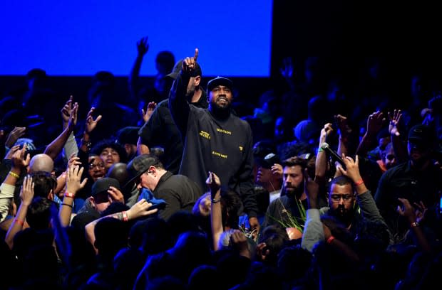 Kanye West performs onstage during his "Jesus Is King" album and film experience at The Forum in Inglewood, California. Photo: Kevin Winter/Getty Images