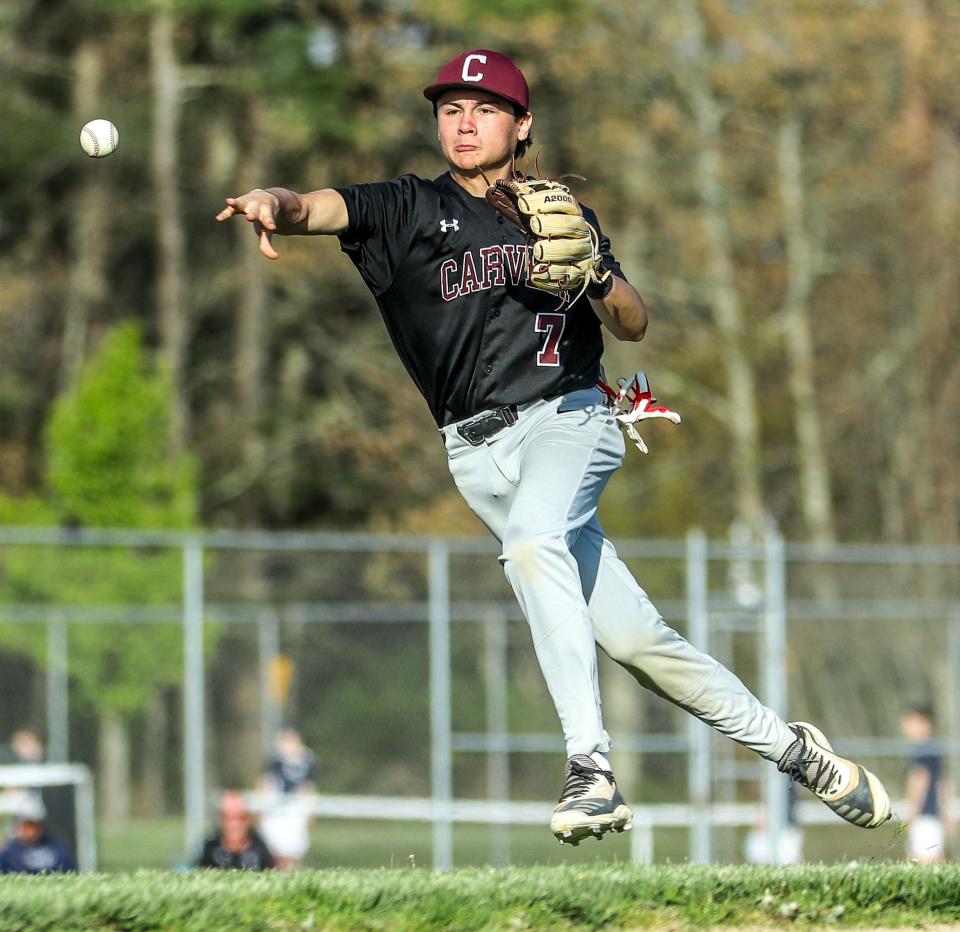 Carver's Tyler Lennox throws out a runner during a game against Cohasset on Thursday, May 12, 2022.