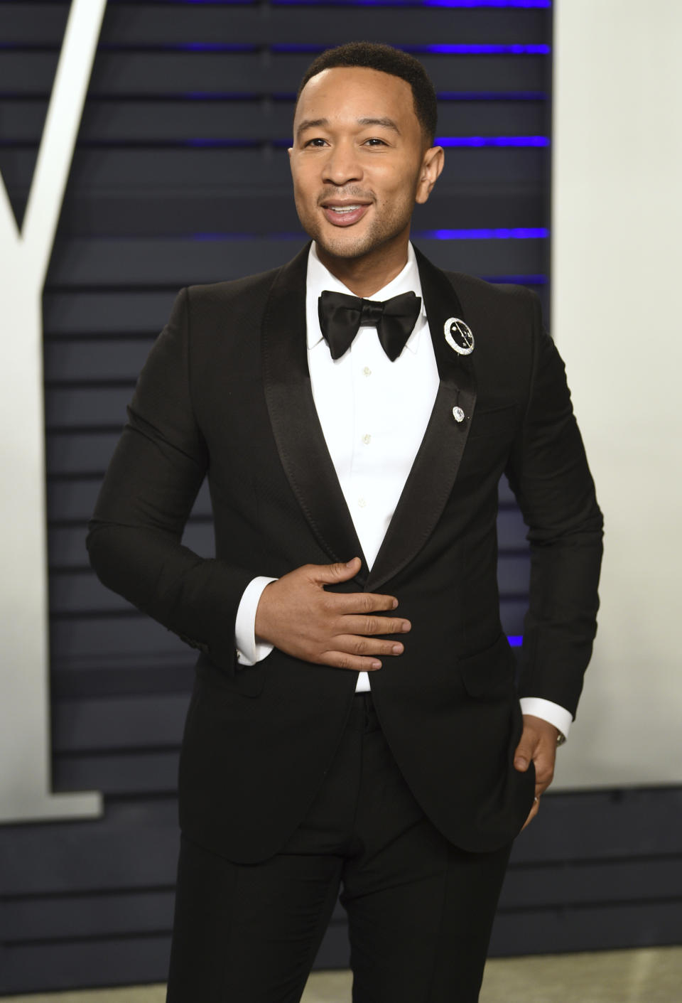 ARCHIVO – En esta fotografía de archivo de 24 de febrero de 2019 John Legend en la fiesta de los Oscar de Vanity en Beverly Hills, California. Legend está nominado al Grammy a mejor álbum vocal pop tradicional por su disco navideño "A Legendary Christmas". (Foto Evan Agostini/Invision/AP, archivo)