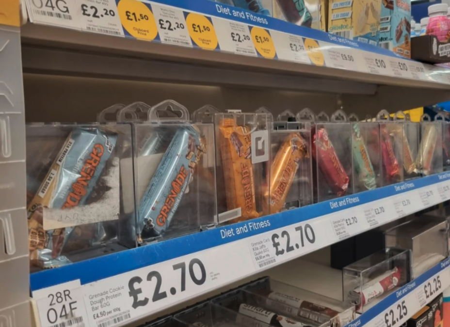 Individual protein bars were placed in clear security cases at a Tesco.