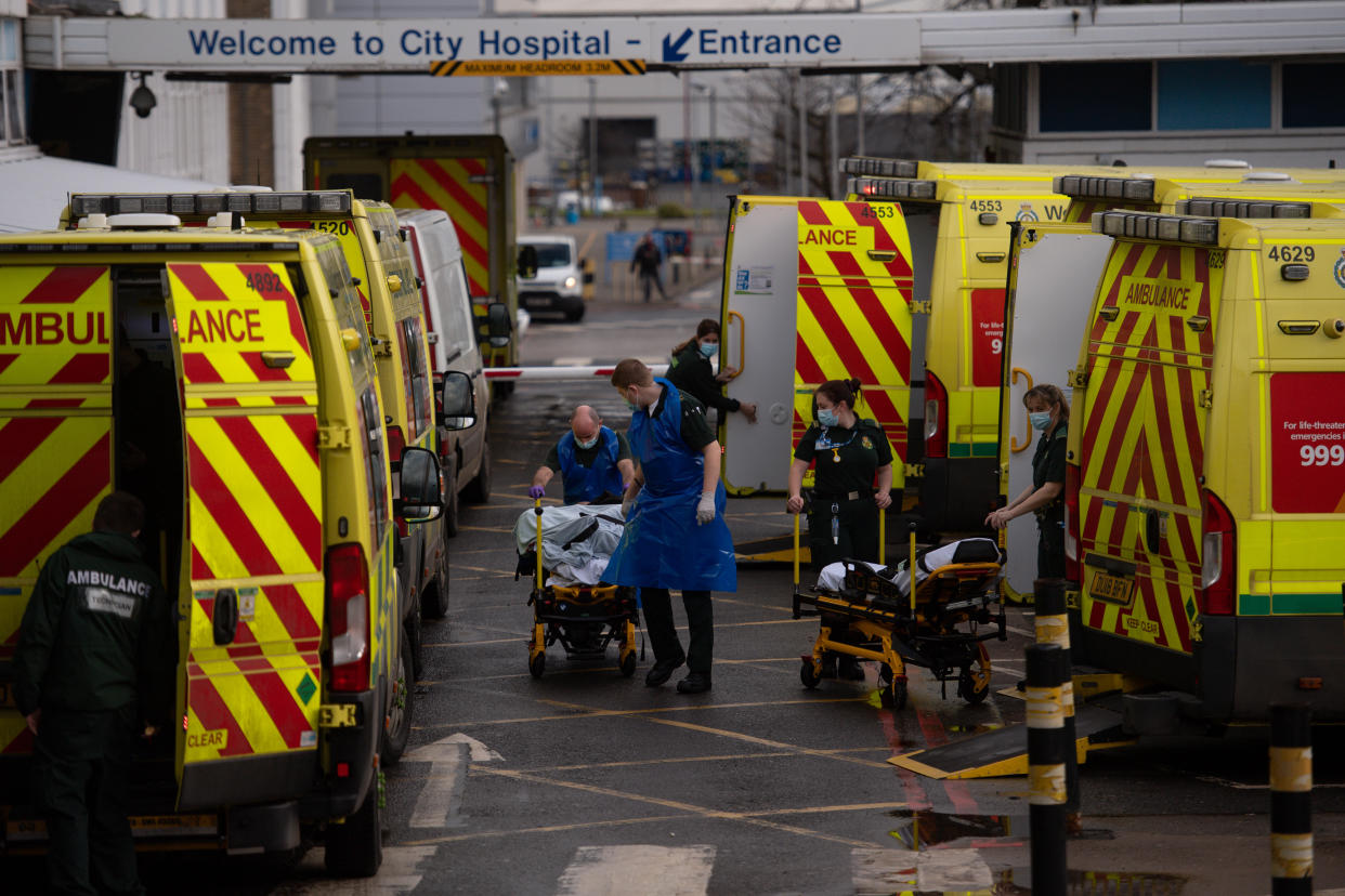 Ambulance crews transport patients into City Hospital in Birmingham. The West Midlands has several areas in the top 10 highest-growing coronavirus numbers.