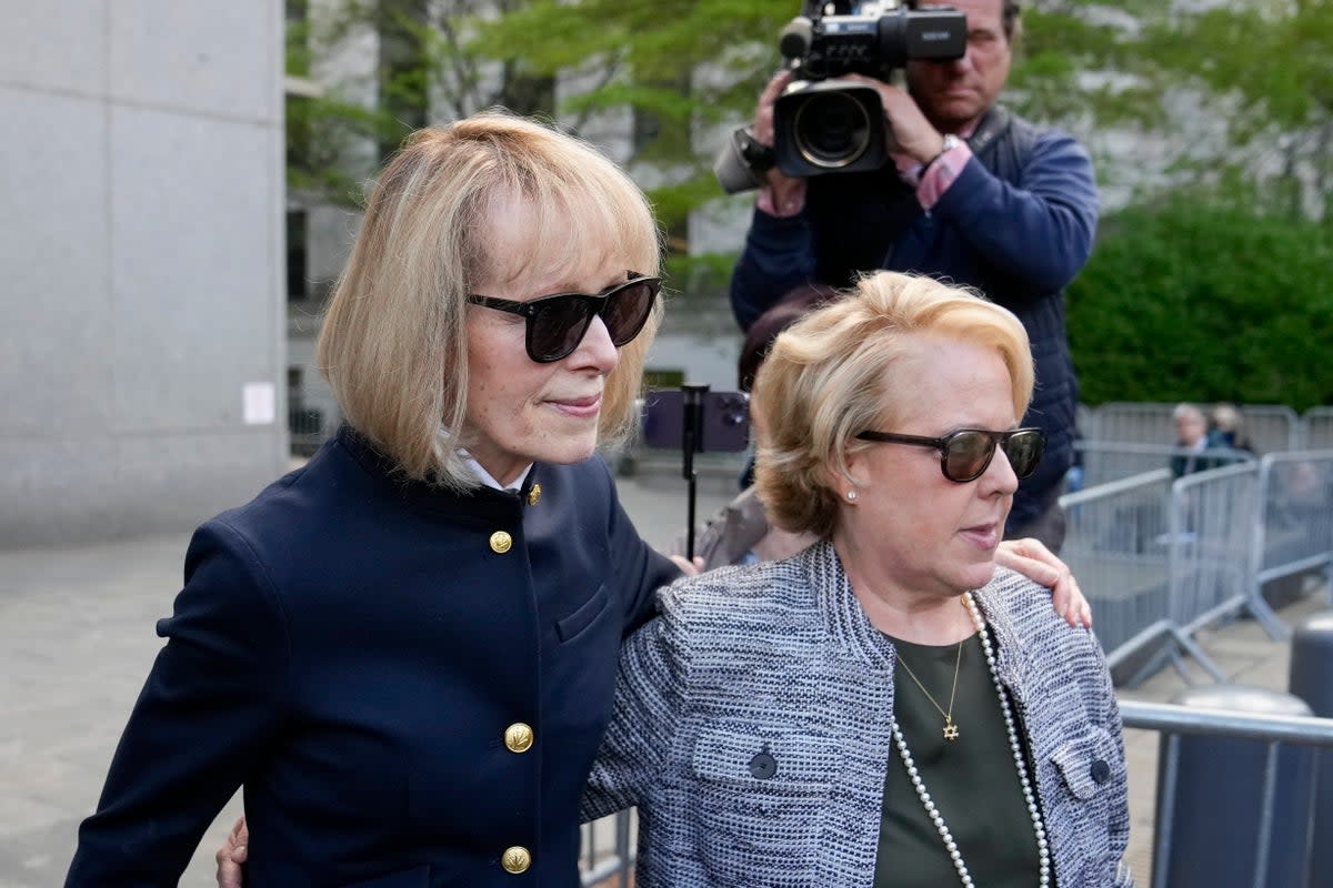 Former Elle advice columnist E Jean Carroll, left, departs Manhattan federal court, with her attorney Roberta Kaplan on Monday, May 1. (AP)