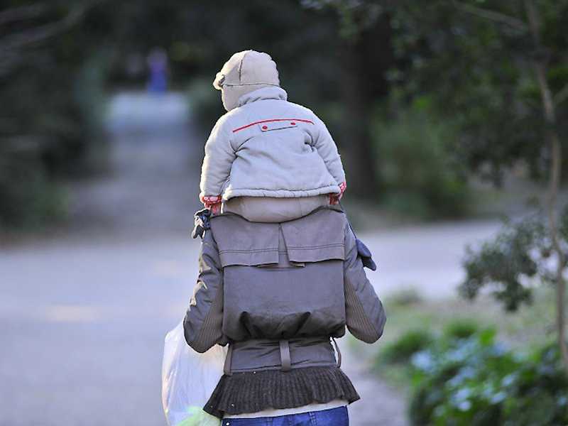 Parent with Child on Shoulders