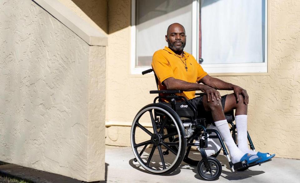 Dion Martin poses for a photo outside of his mother’s home on Monday, Nov. 28, 2022, in Kansas City, Kan.