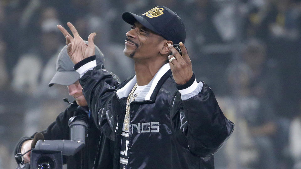 Snoop Dogg wants to help grow the game of hockey. (AP Photo/Ringo H.W. Chiu)