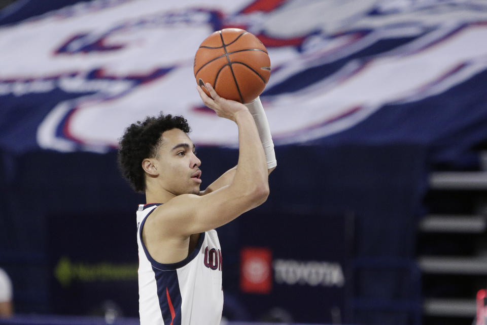 Gonzaga guard Andrew Nembhard shoots during the first half of an NCAA college basketball game against San Francisco in Spokane, Wash., Saturday, Jan. 2, 2021. (AP Photo/Young Kwak)
