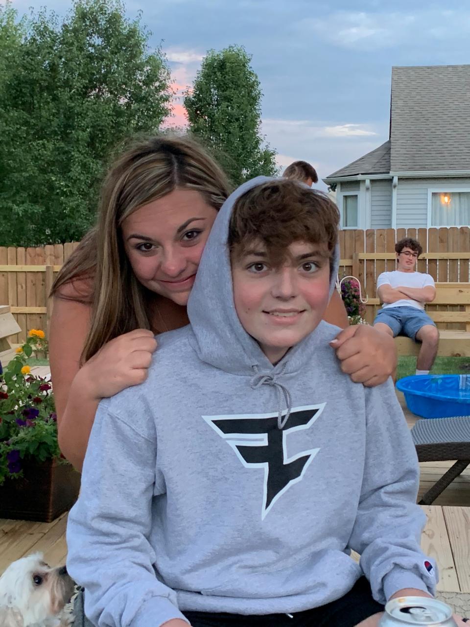 Kaitlin and Chase Smith on their deck at their home in August 2020.