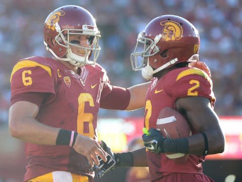  Cody Kessler #6 of the USC Trojans celebrates his touchdown pass to Adoree' Jackson #2