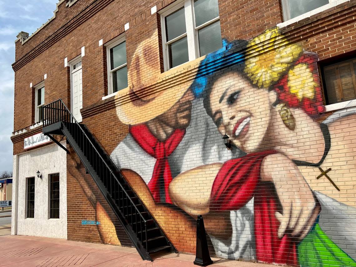 A mural facing East Central Avenue marks The Original on North Main Street.