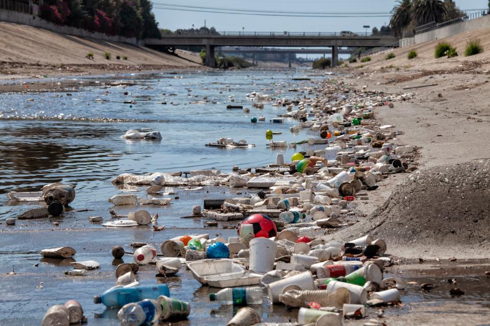 Trash accumulates along Ballona Creek in Culver City, California after heavy rains.