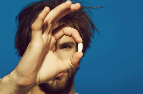   <span class="attribution"><a class="link " href="https://www.shutterstock.com/image-photo/drug-antidepressant-man-pill-hand-guy-1171112872" rel="nofollow noopener" target="_blank" data-ylk="slk:Volodymyr TVERDOKHLIB/Shutterstock;elm:context_link;itc:0;sec:content-canvas">Volodymyr TVERDOKHLIB/Shutterstock</a></span>