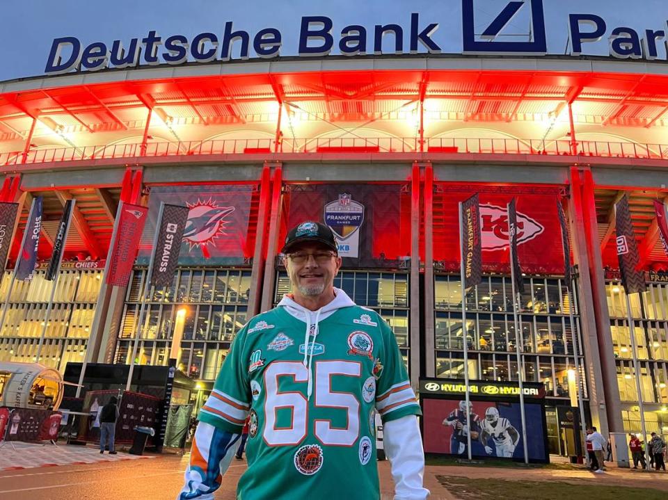 Danny Johnson, founder Dolphins fan club and charity “The Positive Porpoise,” poses for a photo outside Deutsche Bank Park for Miami’s game against the Chiefs.
