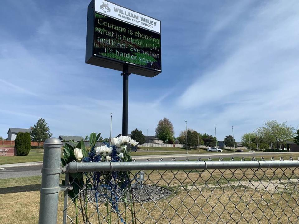 Flowers were placed at William Wiley Elementary School in West Richland, Wash., after paraeducator Amber M. Rodriguez was shot outside the school.