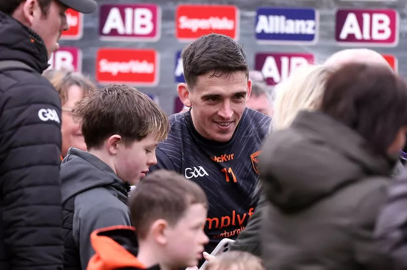 Armagh's Rory Grugan pictured with fans after the game