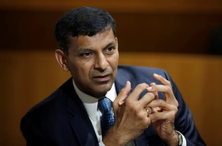 FILE PHOTO - India’s former RBI Governor Rajan, gestures during an interview with Reuters in New Delhi