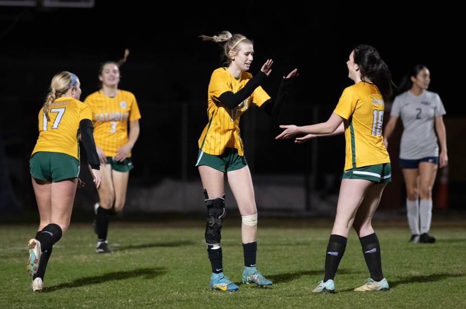 The Crusaders celebrate taking a 2-0 lead during the Walton vs Catholic girls playoff soccer game at Pensacola Catholic High School on Monday, Jan. 29, 2024.