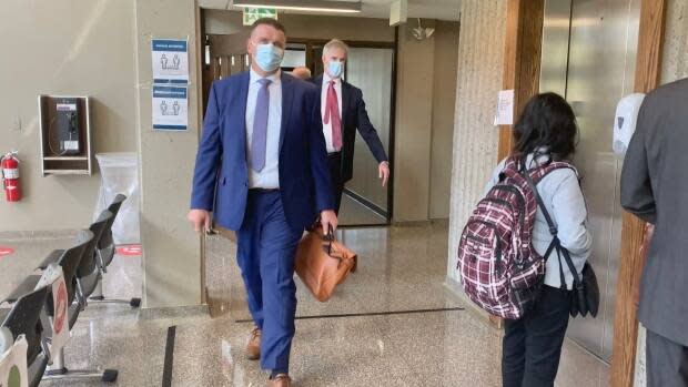 Colin Sproul of the Unified Fisheries Conservation Alliance is seen exiting the courtroom at the Nova Scotia Supreme Court on Wednesday. (CBC - image credit)