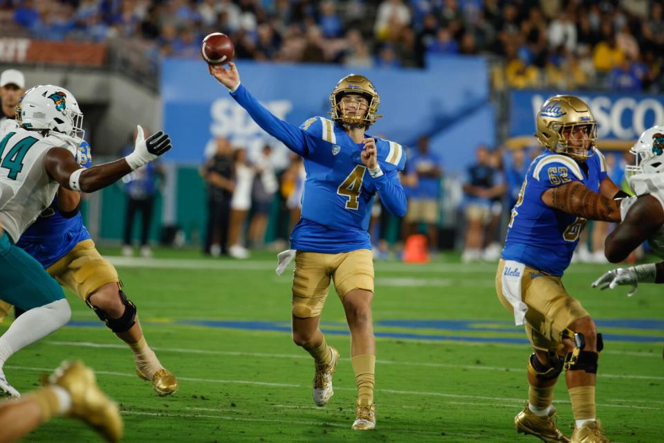 UCLA quarterback Ethan Garbers throws the ball.