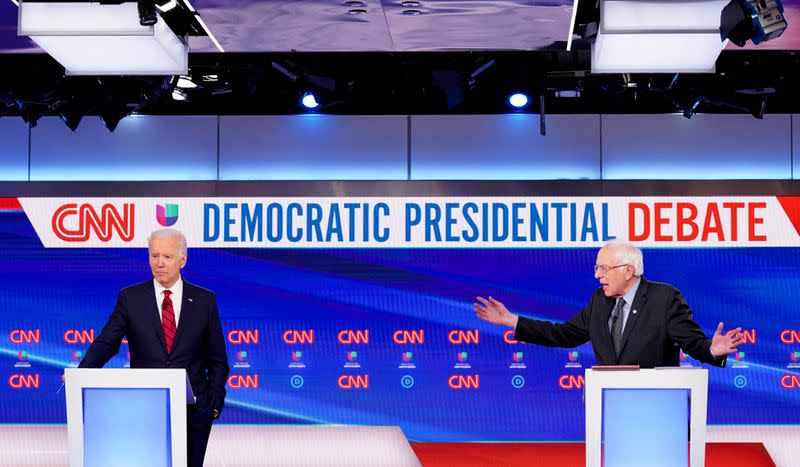 Democratic U.S. presidential candidates Senator Bernie Sanders and former Vice President Joe Biden at the 11th Democratic candidates debate of the 2020 U.S. presidential campaign in Washington