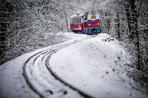 It chugs along through the fairyland forest outside Budapest - Credit: ALAMY