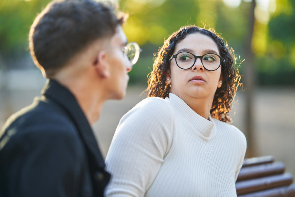 woman leaning back in surprise