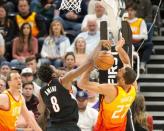 Jan 21, 2019; Salt Lake City, UT, USA; Portland Trail Blazers forward Al-Farouq Aminu (8) and Utah Jazz center Rudy Gobert (27) battle for a loose ball during the second half at Vivint Smart Home Arena. Mandatory Credit: Russ Isabella-USA TODAY Sports