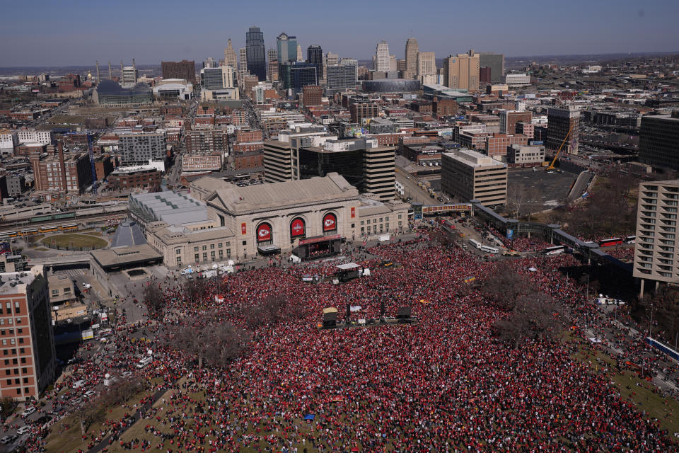The Kansas City Chiefs celebrate during their victory parade in Kansas City, Mo., Wednesday, Feb. 14, 2024. The Chiefs defeated the San Francisco 49ers Sunday in the NFL Super Bowl 58 football game. (AP Photo/Charlie Riedel)