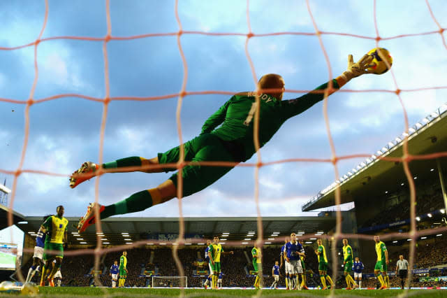 LIVERPOOL, ENGLAND - JANUARY 11: (Alternate crop of #461804527) John Ruddy of Norwich City fails to stop the free kick by Kevin Mirallas of Everton during the Barclays Premier League match between Everton and Norwich City at Goodison Park on January 11, 2014 in Liverpool, England.  (Photo by Jan Kruger/Getty Images)