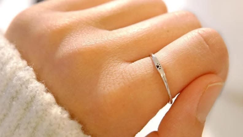 This delicate ring will serve as a constant reminder of your furry friend.