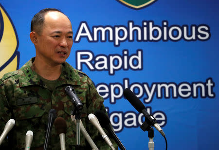 Maj. Gen. Shinichi Aoki, commander of Japanese Ground Self-Defense Force (JGSDF)'s Amphibious Rapid Deployment Brigade, Japan's first marine unit since World War Two, attends a news conference after activating the brigade at JGSDF's Camp Ainoura in Sasebo, on the southwest island of Kyushu, Japan April 7, 2018. REUTERS/Issei Kato