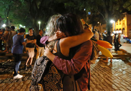 Supporters of Fernando Haddad, presidential candidate of Brazil's leftist Workers Party (PT), react during a runoff election in Rio de Janeiro. REUTERS/Sergio Moraes