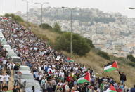 Israeli Arab protesters shout slogans during a demonstration against the outlawing of the Islamic Movement's northern branch, in the northern Israeli-Arab town of Umm el-Fahm November 28, 2015. REUTERS/Ammar Awad