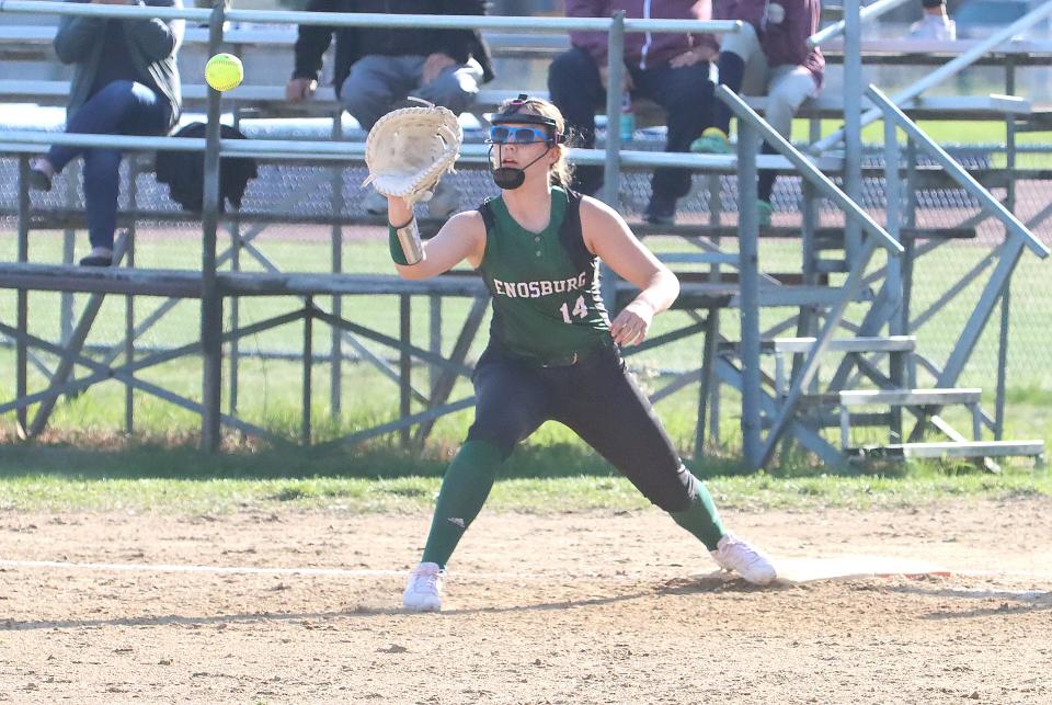 Enosburg first baseman Erica Goodhue receives a throw during the Hornets 3-0 win over Essex in 2023.